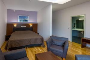 Postel nebo postele na pokoji v ubytování Viiking Spa Hotel