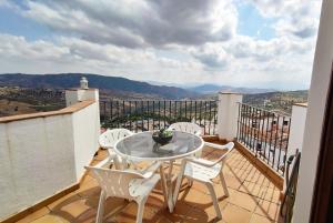Balcony o terrace sa Exclusivo LOFT en el corazón de Casarabonela!