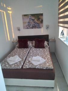 Postelja oz. postelje v sobi nastanitve Apartman Deluxe
