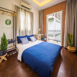 Giường trong phòng chung tại Cactusland Homestay - Tran Hung Dao