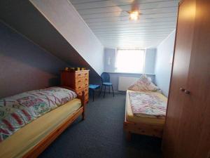 Postel nebo postele na pokoji v ubytování Ferienwohnung Olm