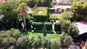 an aerial view of a house with trees and bushes at Le Case Del Vivaio in Sciacca