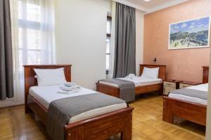 מיטה או מיטות בחדר ב-Hotel Kutko