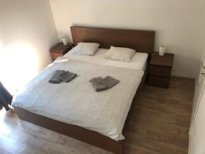 Voodi või voodid majutusasutuse Apartmán v centre Michaloviec toas