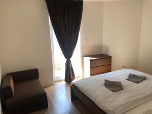 Voodi või voodid majutusasutuse Apartmán v centre Michaloviec toas
