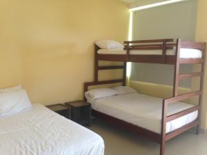 Postel nebo postele na pokoji v ubytování Casa y Mar Hotel