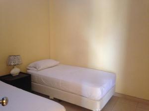 Postel nebo postele na pokoji v ubytování Casa y Mar Hotel