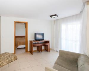 TV a/nebo společenská místnost v ubytování Aquaria Natal Hotel
