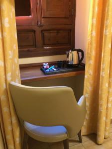 Příslušenství pro přípravu čaje a kávy v ubytování Hostal Loreto