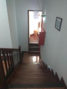 a stairway leading to a hallway with a door at Hotel Paulista in Porto +129 photos