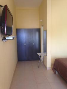 TV a/nebo společenská místnost v ubytování Casa y Mar Hotel