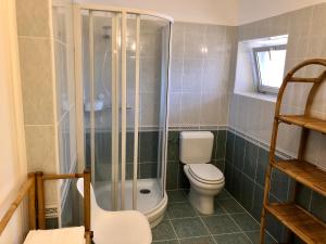 Koupelna v ubytování Árkád Apartmanház Szeged