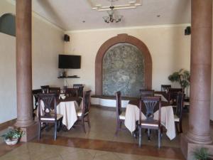 Ресторант или друго място за хранене в Casa Celia Hotel Restaurante