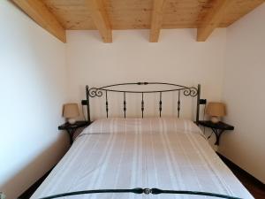 Postel nebo postele na pokoji v ubytování Villa Daniela