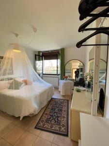 A bed or beds in a room at GARDEN OF VENICE