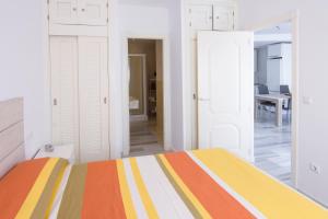 Łóżko lub łóżka w pokoju w obiekcie Apartamento con vistas al mar en Carboneras