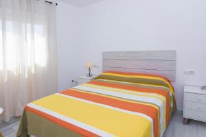 Łóżko lub łóżka w pokoju w obiekcie Apartamento con vistas al mar en Carboneras