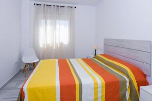 Łóżko lub łóżka w pokoju w obiekcie Apartamento con vistas al mar en Carboneras