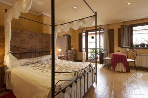 Кровать или кровати в номере Casa Rural Cerro de Mirabel