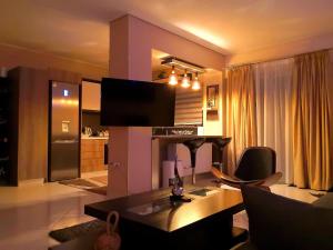 TV a/nebo společenská místnost v ubytování Luxury Home