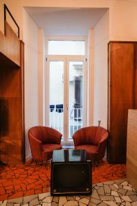 Ruang duduk di NAP Hostel Spaccanapoli