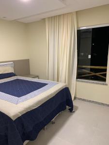 Katil atau katil-katil dalam bilik di Condomínio e resort Villa das Águas - Praia do Saco SE