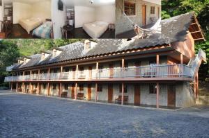 two pictures of a building with a balcony at Quilombo Hotel Fazenda in União dos Palmares