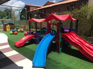 Parc infantil de Apartamento Barra Bali Resort