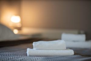 Łóżko lub łóżka w pokoju w obiekcie VIP Apartamenty Białystok