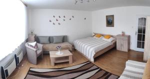 Postel nebo postele na pokoji v ubytování Holiday Home Liptovský Peter