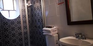 Koupelna v ubytování Hotel Sautto