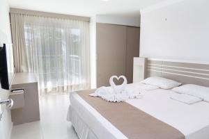 Krevet ili kreveti u jedinici u okviru objekta Golf Ville Resorts Suites