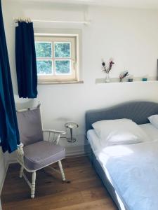 Postel nebo postele na pokoji v ubytování Landhaus mitten in der Lüneburger Heide