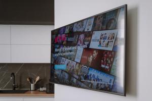 TV a/nebo společenská místnost v ubytování THE City Lodge - Boutique Apartments