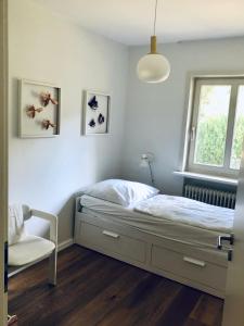 Postel nebo postele na pokoji v ubytování Landhaus mitten in der Lüneburger Heide