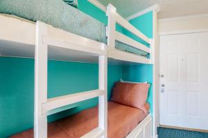 Двуетажно легло или двуетажни легла в стая в Casa Del Mar Beachfront II
