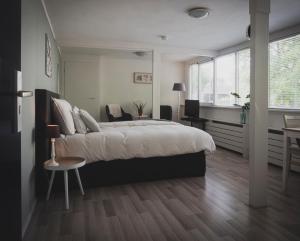 Postel nebo postele na pokoji v ubytování B&B Het Ruime Sop