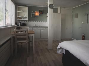 Kuchyň nebo kuchyňský kout v ubytování B&B Het Ruime Sop