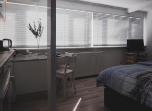 Postel nebo postele na pokoji v ubytování B&B Het Ruime Sop
