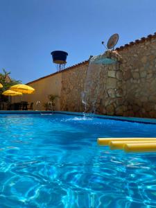 Het zwembad bij of vlak bij Estrela D Alva Pousada