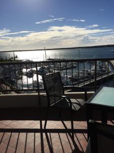 a view from a balcony overlooking a beach at Broadwater Shores Waterfront Apartments in Gold Coast