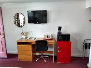 Kuchyň nebo kuchyňský kout v ubytování Holiday Motel Bend