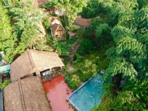 an aerial view of a resort with a swimming pool at Moc Chau Retreat in Mộc Châu
