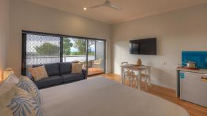 A television and/or entertainment centre at Atherton Apartments