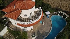 an overhead view of a house with a swimming pool at Villa Sky Music in Obzor