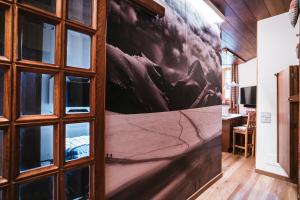 Televisi dan/atau pusat hiburan di THE NEST Apartment Suite Ski-in Ski-out with Hammam