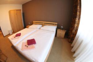 Ein Bett oder Betten in einem Zimmer der Unterkunft Hotel SPECTRUM