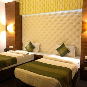 Postel nebo postele na pokoji v ubytování Hotel Ivory 32