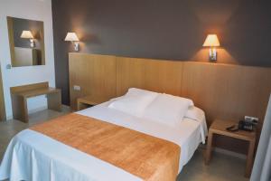 Postel nebo postele na pokoji v ubytování Hotel Alba Seleqtta