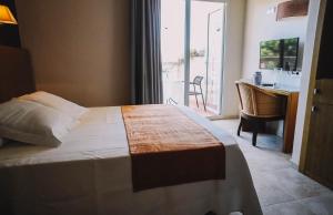 Postel nebo postele na pokoji v ubytování Hotel Alba Seleqtta